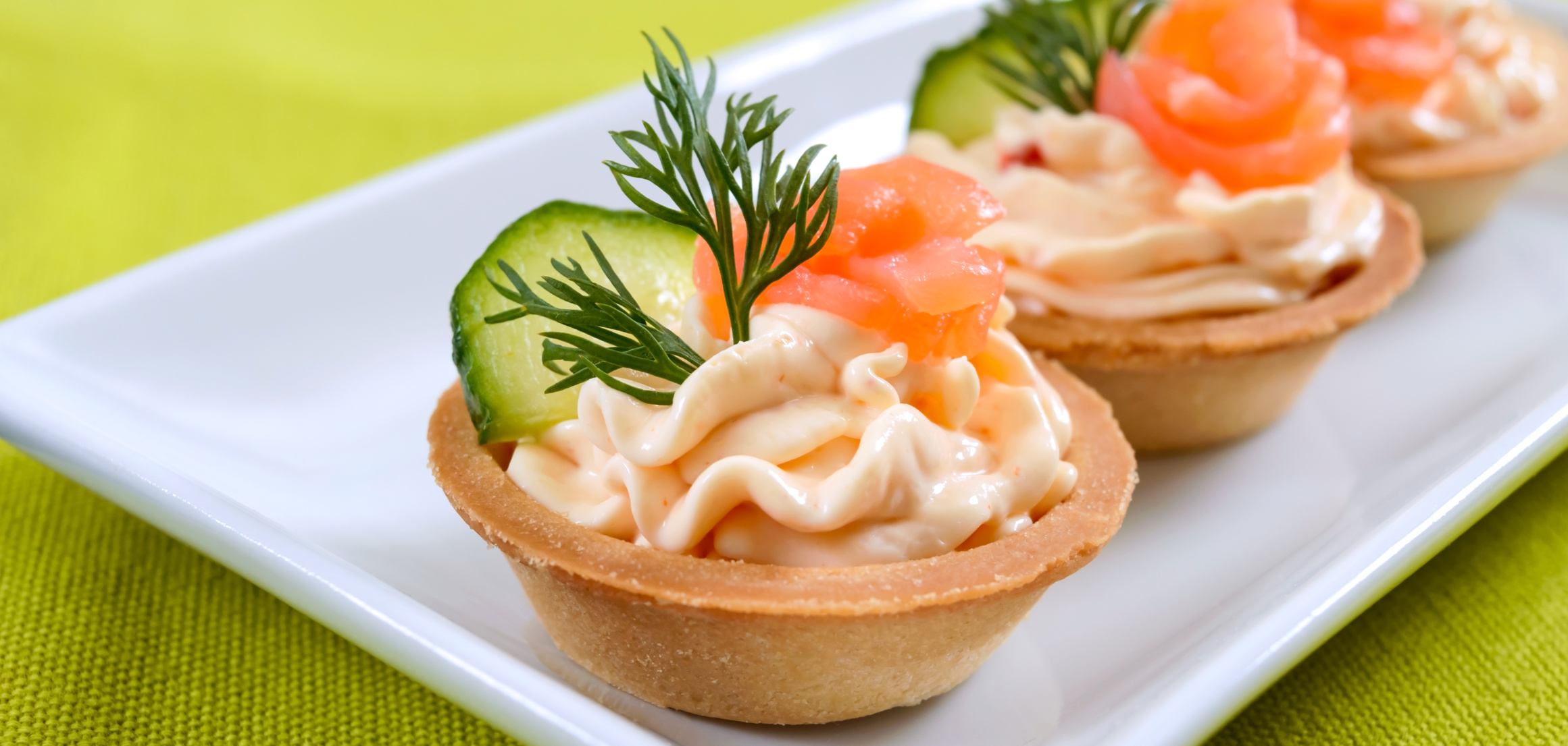 Tartlets with Cream Cheese and Salted Salmon on a Plate