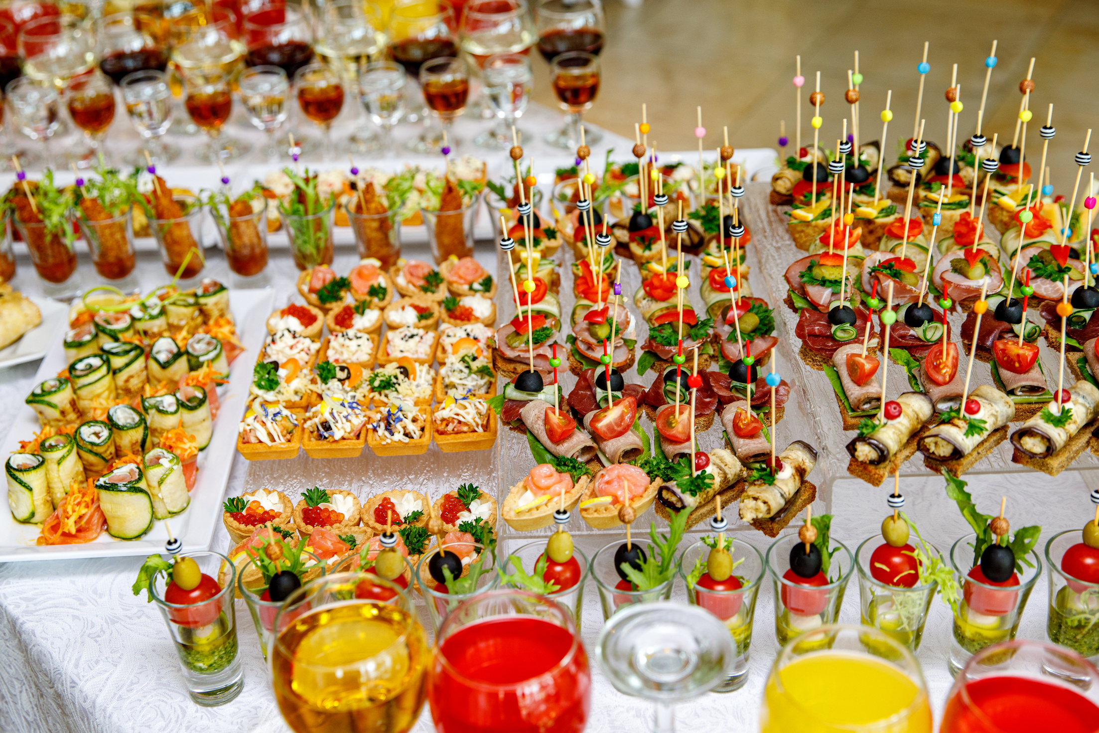 Snack table ready for event. Food and drink catering.